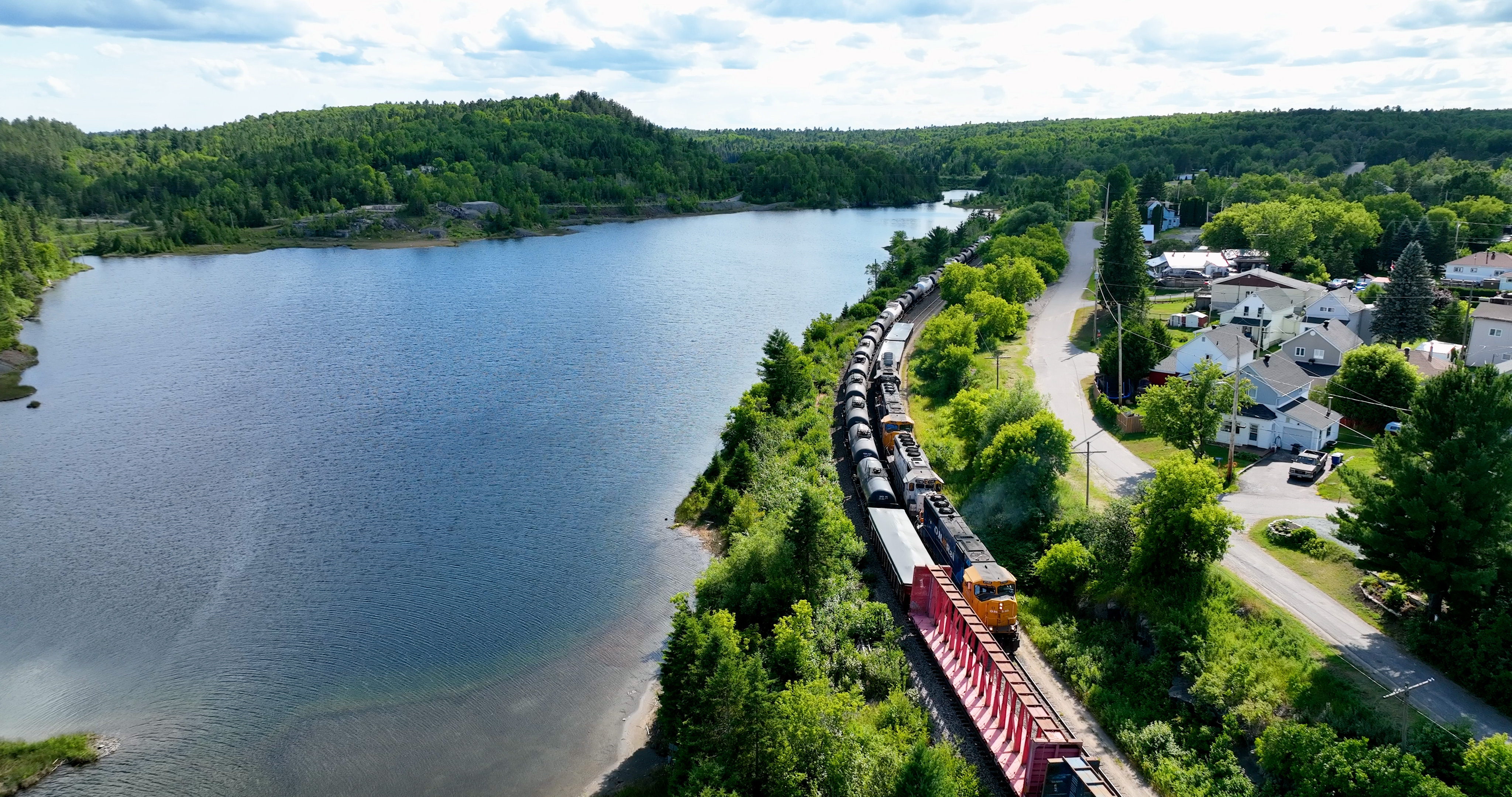 Ariel view of train beside river